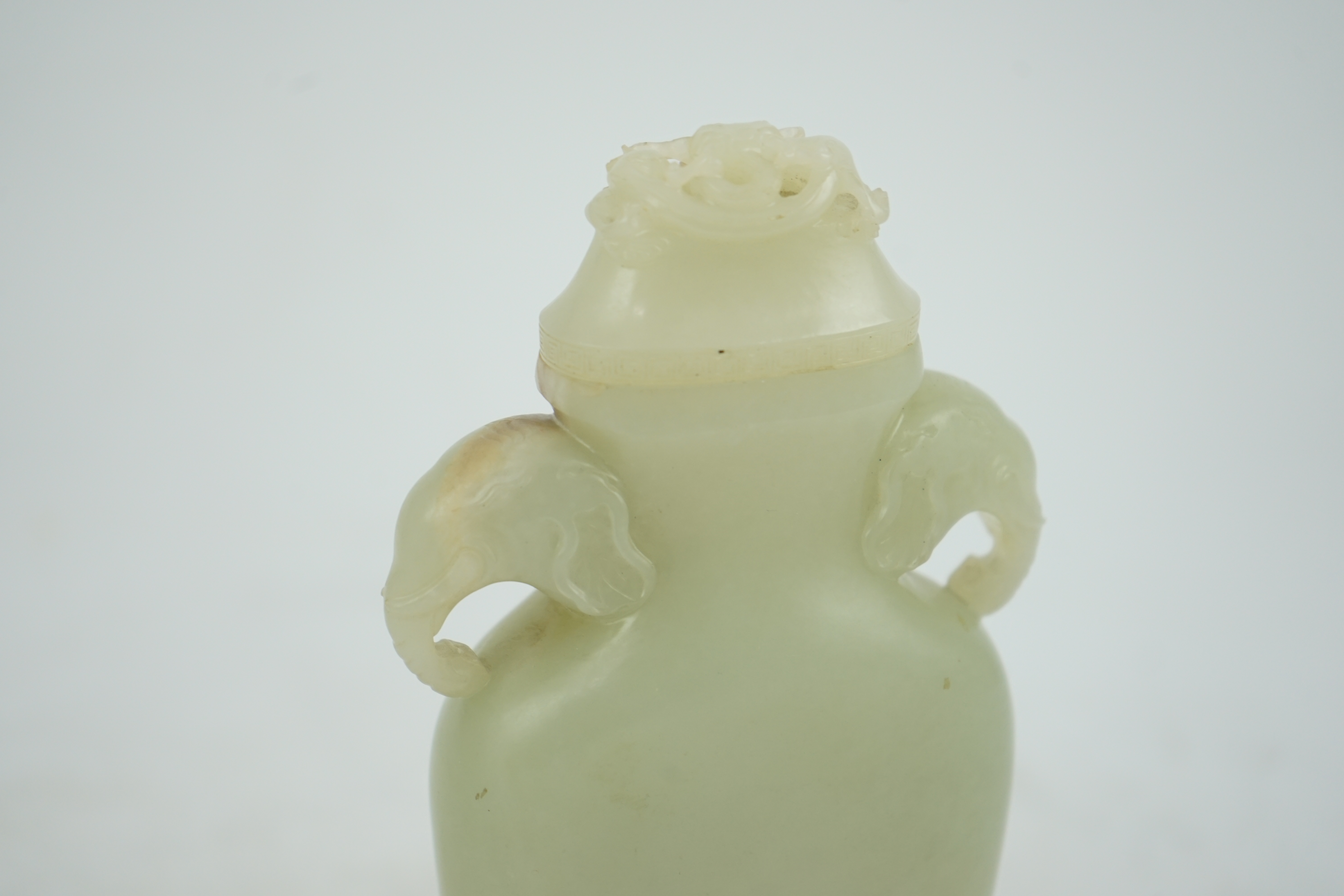 A Chinese pale celadon jade flask-form vase and cover, Qianlong/Jiaqing period, c.1780-1820